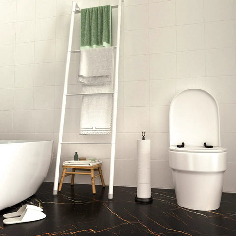 Bathroom with Heavy Weighted Free Standing Toilet Paper Holder With Reserve Function Matte Black Finish beside toilet.