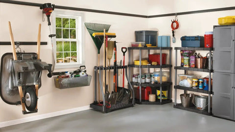 Organized garage with Garage Tool Tower Rack with Casters, holding up to 40 long-handled tools like rakes and shovels, head-down storage.