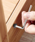 Person using Allen tool on Rock Solid 1/4 20 X 1 Flat Head Hex Socket Cap Screws for assembly or repair.