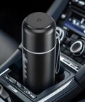 Road Warrior Approved Fast Boiling Electric Kettle For Cars And Trucks Featuring Food Grade 304 Stainless Steel For Quick Brews On The Go With 12 Volt Compatibility For Truckers And Adventure Seekers in car cup holder.