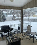 Beefy 10x12 Clear Vinyl Tarp 24 Mil Thick Heavy Duty Waterproof Cover with grommets enclosing snow-covered patio