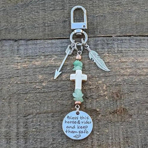 Close-up of Saddle And Bridle Charm Clip Made From Premium Leather Strings With Clip Bless This Horse And Rider Keep Them Safe