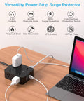 8 Outlet Power Strip With 4 USB Ports 5 Ft Flat Plug Wall Mount ETI Listed Black on desk with laptop and cables