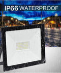 JUDYSSY Security Lights 30W Led Flood Light Outdoor Spotlight Floodlight Refle, Cool，Warm，Warm in a rainy setting showcasing IP66 waterproof features.