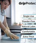 Heavy Duty 8 Mil Latex Gloves Powder Free 100 Count Thick Disposable Gloves snag resistant worn while cleaning a surface.