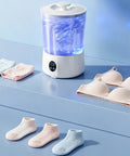 Slick Portable Mini Washing Machine For Underwear And Socks Featuring Three Gentle Wash Programs with colorful bras and socks.