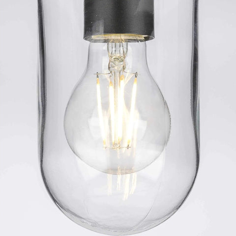 Close-up of light bulb in Coastal Style Two Light Bath Vanity Light With Clear Glass Shades, Polished Chrome Finish, Modern Bathroom Lighting