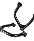 67-52640 Upper Control Arms For Toyota Tundra Stock Leveling And Big Lift - Beefed-Up Heavy Duty DOM Tubing, New Bushings, High Angle Ball Joint, Terrain Control Technology, Fits 4x4 And RWD. Black DOM upper control arms with bushings
