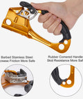 Right Hand Orange Rope Ascender For 8-13mm Rope shown in hand, rubber-covered handle, stainless steel barbs visible, aluminum body