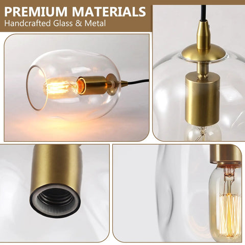 Pendant Lights Kitchen Island, Hand-Blown Clear Glass Brass Gold 9 Inch H with illuminated bulb and metallic fixture details.