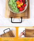 Heavy Duty Matte Black Iron Pulls For Cutting Boards And Serving Trays 8 Pack Cabinet Hardware attached to a wooden tray with fruit.