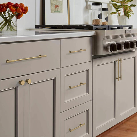 Champagne Bronze Cabinet Knobs 10 Pack Champagne Gold Cabinet Pulls for cabinets and drawers in a modern kitchen setting