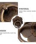 Close-up of Vintage Metal Cabinet Pulls With Lotus Ring Handles Antique Bronze Drawer Knobs, highlighting material and design features.