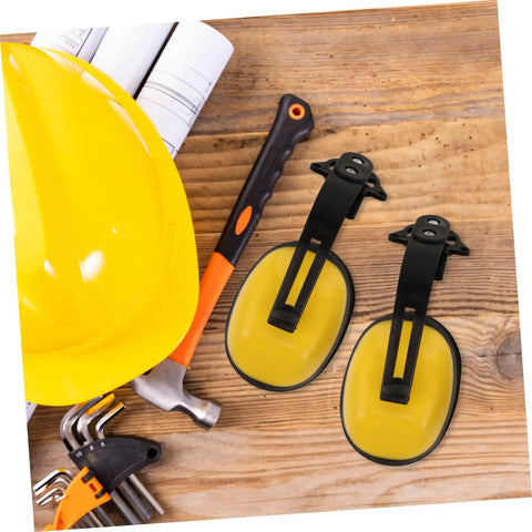 Job Site Tough Safety Hard Hat Ear Muffs With Integrated Noise Blocking Cups For Industrial Hearing Protection And Heavy Duty Construction Environments on a workbench with tools.