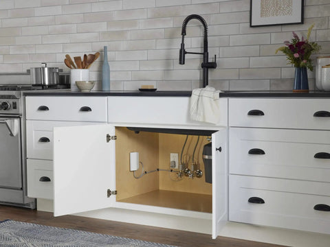 Modern kitchen with Smart Home Water Monitor with Instant Leak Detection and Real Time Alerts under sink cabinet