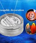 Blue Submersible LED Light Set Tiny But Mighty Battery Powered Flameless Lights With Up To 100 Hours Of Continuous Brightness Waterproof For Wedding Vase Arrangements Party Decor Or Poolside Vibes 24 Pcs shown with Halloween decorations