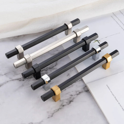 Ten Pack 3 Inch Hole Center Black And Gold Cabinet Pulls Matte Black Hexagon Bar With Brushed Gold Bases on marble