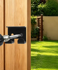 Qlvily 36" Heavy Duty Cane Bolt Gate Drop Rod being installed on wood fence post with black latch and drill.