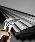 3 Inch Hand Seamer Sheet Metal Tool With Offset Design held against a stack of metal sheets, angled view.