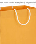 Close-up of orange gift bag with woven handles, part of Pastel Color Recyclable Gift Bag Set With Eight Assorted Sizes For All Occasions.