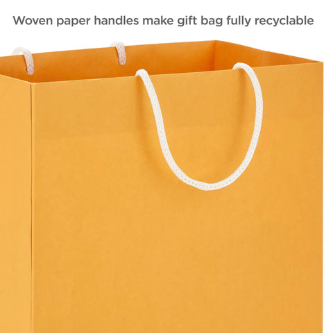Close-up of orange gift bag with woven handles, part of Pastel Color Recyclable Gift Bag Set With Eight Assorted Sizes For All Occasions.