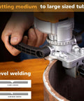 Handheld chamfer tool; metal body with black ergonomic handle beveling a pipe edge (side view)