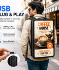 Hella Bright 21 5 Inch Lcd Backpack Mobile Ads showing a USB plug for easy content updates, worn by a man outdoors.