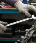 Mechanic using 12 Piece 12 Point Metric Wrench Set 8mm To 19mm With 15 Degree Ring Head Angles And Hip Grip Ends