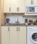 Kitchen cabinets with 5 inch matte black cabinet handles made from solid zinc alloy for cupboard and drawer hardware.