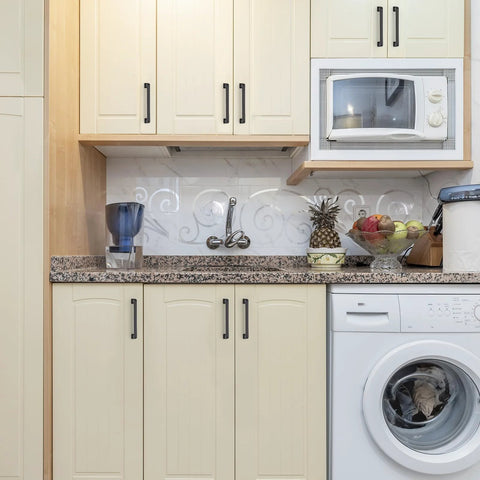 Kitchen cabinets with 5 inch matte black cabinet handles made from solid zinc alloy for cupboard and drawer hardware.