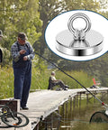 Ultra Strong Neodymium Fishing Magnet 1200 Lbs Pulling Power Three Point Nine Four Inch Diameter With Countersunk Hole Eyebolt in use by anglers