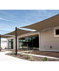18 By 22 Ft Sun Shade Sail With A Ring Wire Rope, covering a patio, breathable 260 GSM HDPE fabric, brown.