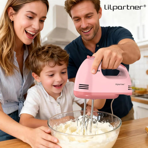 Family using light pink Hand Mixer Electric With Seven Speeds And Five Stainless Attachments Copper Motor in kitchen