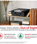 Compact Fireproof Safe Box With Digital Keypad Lock For Home Use, Stash Safe For Jewelry Cash And Important Documents, Built With Double Steel Walls, 0.26 Cu Ft Capacity, Black, displayed on a shelf among books.