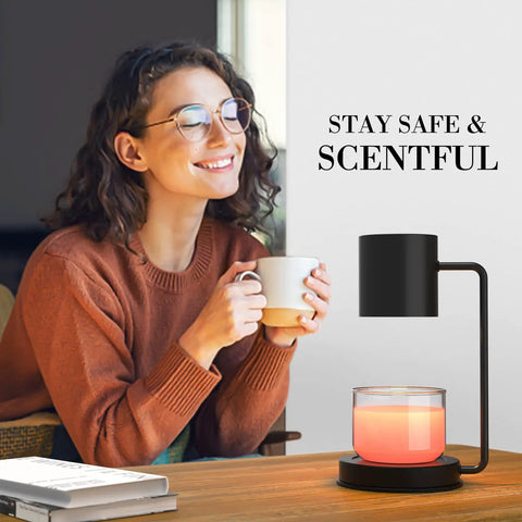 Smiling woman with mug next to black desk lamp with candle, inspirational text in background.