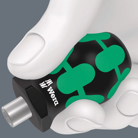 Stubby Bit-Holding Screwdriver 811/1 in hand, compact design for tight spaces, precision driver with green-black handle