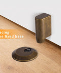 Premium Retractable Magnetic Door Stopper With Adjustable 0.4 Inch Base prevents slamming, showing fixed base on floor.