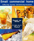 Heavy Duty Stainless Steel Ice Maker Churning Out Fifteen Kilograms Rapid Clear Ice For Compact Countertop Setup Straight Up Fast Two Twenty Volt Kitchen Gear That Brings Home Bar Vibes Every Time Without Any Fuss Ever Smooth Operator, showcasing beverages with round ice.