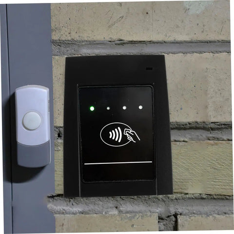 Kick Up Your Security Game With This Bulletproof Plastic Shell Built Tough For Ic And Id Card Readers Providing Flawless Access Control Protection For High Traffic Business Environments Where Reliability Is Non Negotiable, featured on an ID card reader mounted on brick wall.