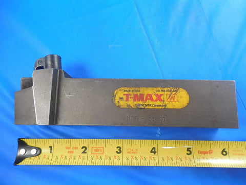 Right Lathe Tool Holder For CNC Machining MTTNR 85 4D One And A Quarter By One Inch Shank, Heavy Duty Precision Adapter For Turning Aluminum And Steel, Durable 4D Series Tooling, Shop Grade Ready For Lathes., shown with tape measure