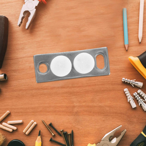 Barn Door Roller Guide And Floor Guide Kit for smooth quiet glide operation with durable iron and nylon hardware on a wooden table.