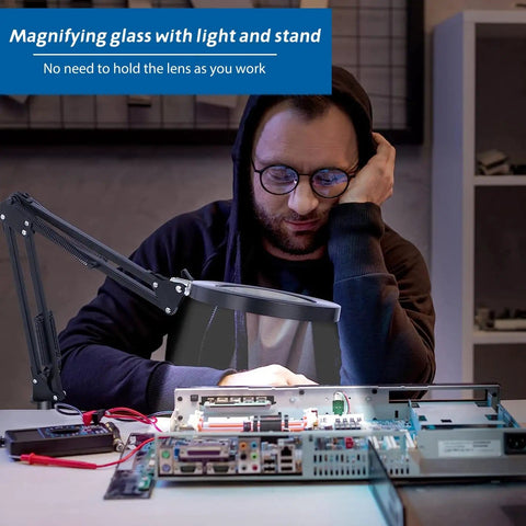 Person using Floor Magnifying Glass With Light And Stand, 10X To 20X Magnification, 72 LED Lamp for electronics repair work.
