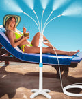 Adjustable Outdoor Patio Misters Stand with Flexible Riser up to 46 inches next to woman relaxing by poolside, 26.2 ft water line visible