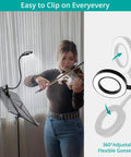 5X Magnifying Desk Clip Lamp With 10 Dimmable Brightness Levels And 3 Color Modes For Reading, Crafting, And Close Work Comes With 5V 2A Adapter Flexible Neck Clamp Mount Black Finish, attached to music stand next to violinist, demonstrating flexible neck and clamp