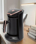 Turkish Coffee Maker Portable Auto Brewer For Home Office Travel And Camping, Compact Electric Pot on desk.