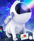 Astronaut-shaped lit cosmic night sky projector for kids and adults with app control and accessories against vibrant nebula background.