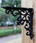 Built Tough Heavy Duty Cast Iron Wall Shelf Brackets Rust Proof 90 Degree Corner Braces, detailed view of black cast iron bracket.