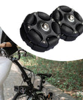 Folding bicycle roller wheels, two black 58mm omni-directional, close-up view