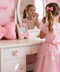 Girl at vanity with Rose Gold Bow Dresser Knobs 4 Pack Decorative Cabinet Hardware For Dressers Cabinets Closets