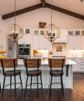 Wood Beaded Chandelier With Four Candle Style Lights For A Cozy Farmhouse Boho Vibe in a modern kitchen setting